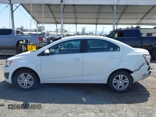 2014 Chevrolet Sonic LT with VIN 1G1JC5SH9E4212898, listed as a IAAI auction lot 41852112 with 121,382 mi miles and . Bid and sale history available at DreamBid. Image 14.