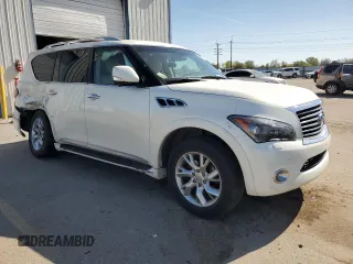 2012 Infiniti QX56 7-passenger with VIN JN8AZ2NE1C9017744, listed as a Copart auction lot 52988725 with 142,820 mi miles and Salvage title. Bid and sale history available at DreamBid. Image 4.