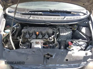 2009 Honda Civic Cpe LX with VIN 2HGFG12679H508263, listed as a IAAI auction lot 41498344 with 128,876 mi miles. Bid and sale history available at carsss.com. Image 10.