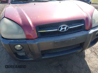 2005 Hyundai Tucson GLS with VIN KM8JN12D35U180615, listed as a IAAI auction lot 42104729 with 128,123 mi miles. Bid and sale history available at carsss.com. Image 12.