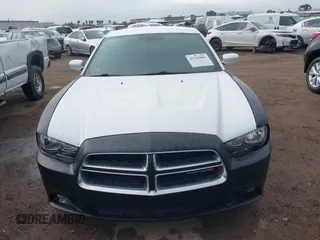 2013 Dodge Charger SE with VIN 2C3CDXBG1DH742921, listed as a IAAI auction lot 41765001 with 196,783 mi miles and . Bid and sale history available at DreamBid. Image 13.