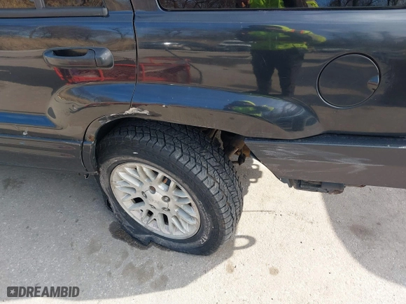 2004 Jeep Grand Cherokee Limited with VIN 1J4GW58N74C120435, listed as a IAAI auction lot 41815094 with 193,056 mi miles. Bid and sale history available at carsss.com. Image 6.