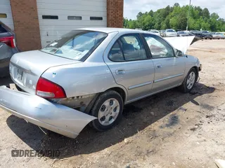 2003 Nissan Sentra XE z VIN 3N1CB51D43L714603, wystawiony jako IAAI lot #42392644 z przebiegiem 201 656 mil mil oraz . Historia ofert i sprzedaży dostępna na DreamBid. Obrazek 4.