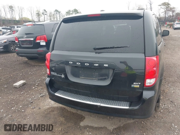 2019 Dodge Grand Caravan SXT with VIN 2C4RDGCG6KR749505, listed as a IAAI auction lot 42087083 with 167,551 mi miles and . Bid and sale history available at DreamBid. Image 16.