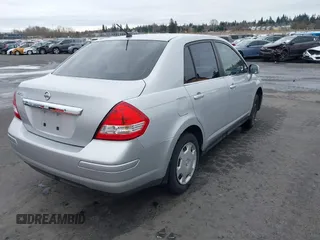2007 Nissan Versa 1.8 SL with VIN 3N1BC11E97L447829, listed as a IAAI auction lot 41612386 with 123,500 mi miles. Bid and sale history available at carsss.com. Image 4.