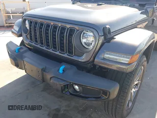 2024 Jeep Wrangler Sport S with VIN 1C4RJXN61RW192386, listed as a IAAI auction lot 42001810 with 7,426 mi miles and . Bid and sale history available at DreamBid. Image 6.
