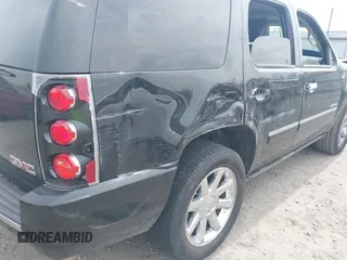 2014 GMC Yukon Denali z VIN 1GKS1EEFXER113493, wystawiony jako IAAI lot #41742662 z przebiegiem 150 382 mil mil oraz . Historia ofert i sprzedaży dostępna na DreamBid. Obrazek 18.