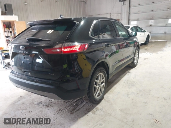 2021 Ford Edge SEL with VIN 2FMPK4J94MBA40692, listed as a IAAI auction lot 41869756 with 44,197 mi miles. Bid and sale history available at carsss.com. Image 4.