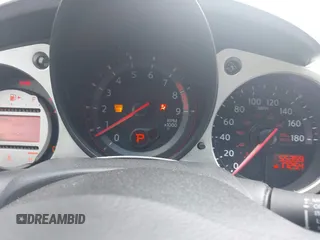 2012 Nissan 370Z z VIN JN1AZ4EH5CM564517, wystawiony jako IAAI lot #42385869 z przebiegiem 55 359 mil mil oraz . Historia ofert i sprzedaży dostępna na DreamBid. Obrazek 7.