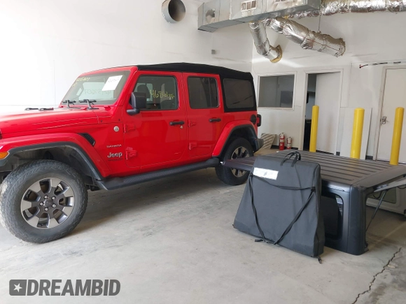 2018 Jeep Wrangler Unlimited Sahara z VIN 1C4HJXEG4JW316496, wystawiony jako IAAI lot #42437607 z przebiegiem 46 861 mil mil oraz . Historia ofert i sprzedaży dostępna na DreamBid. Obrazek 17.