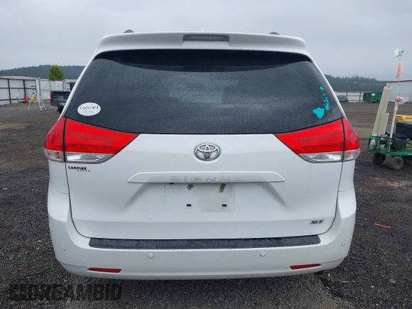 2012 Toyota Sienna XLE AAS z VIN 5TDYK3DC3CS215411, wystawiony jako IAAI lot #42333328 z przebiegiem 123 677 mil mil oraz . Historia ofert i sprzedaży dostępna na DreamBid. Obrazek 17.