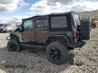 2010 Jeep Wrangler Unlimited Sahara with VIN 1J4HA5H13AL182071, listed as a Copart auction lot 51696665 with 178,026 mi miles and Salvage Title. Bid and sale history available at carsss.com. Image 2.