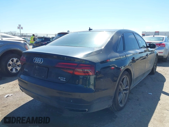 2017 Audi A8 L Sport with VIN WAU43AFD2HN000635, listed as a IAAI auction lot 41686835 with 91,203 mi miles. Bid and sale history available at carsss.com. Image 4.