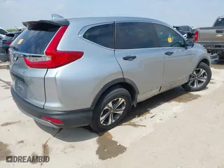 2017 Honda CR-V LX with VIN 7FARW5H38HE014201, listed as a IAAI auction lot 42044460 with 82,174 mi miles. Bid and sale history available at carsss.com. Image 4.