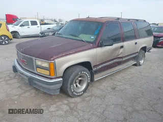 1993 GMC Suburban with VIN 1GKEC16KXPJ734150, listed as a IAAI auction lot 42114021 with 254,501 mi miles and . Bid and sale history available at DreamBid. Image 2.