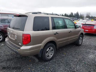 2004 Honda Pilot EX with VIN 2HKYF18694H538107, listed as a IAAI auction lot 41547655 with 254,755 mi miles. Bid and sale history available at carsss.com. Image 4.