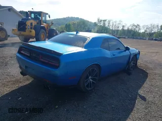 2016 Dodge Challenger R/T Scat Pack z VIN 2C3CDZFJ9GH100372, wystawiony jako IAAI lot #42221915 z przebiegiem 66 896 mil mil oraz . Historia ofert i sprzedaży dostępna na DreamBid. Obrazek 4.