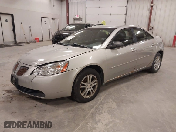 2006 Pontiac G6 1SV z VIN 1G2ZF55B264218234, wystawiony jako IAAI lot #41875165 z przebiegiem 226 618 mil mil oraz . Historia ofert i sprzedaży dostępna na DreamBid. Obrazek 2.