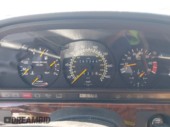 1991 Mercedes-Benz 560 with VIN WDBCA45E7MA610580, listed as a IAAI auction lot 42099161 with 83,344 mi miles and . Bid and sale history available at DreamBid. Image 7.