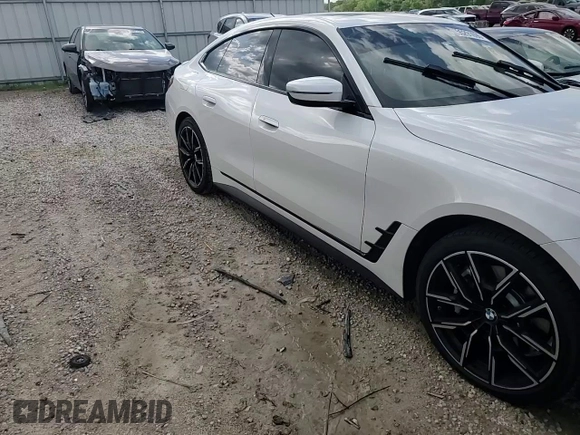 2023 BMW 4 Series 430i xDrive z VIN WBA73AV08PFM91846, wystawiony jako Copart lot #55291695 z przebiegiem Nie podano mil oraz Szkoda całkowita • Salvage title. Historia ofert i sprzedaży dostępna na DreamBid. Obrazek 13.