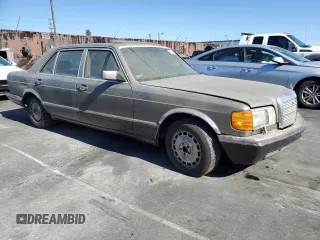 1989 Mercedes-Benz 560 with VIN WDBCA39D7KA428953, listed as a Copart auction lot 80856634 with 243,871 mi miles and Clean Title. Bid and sale history available at DreamBid. Image 4.