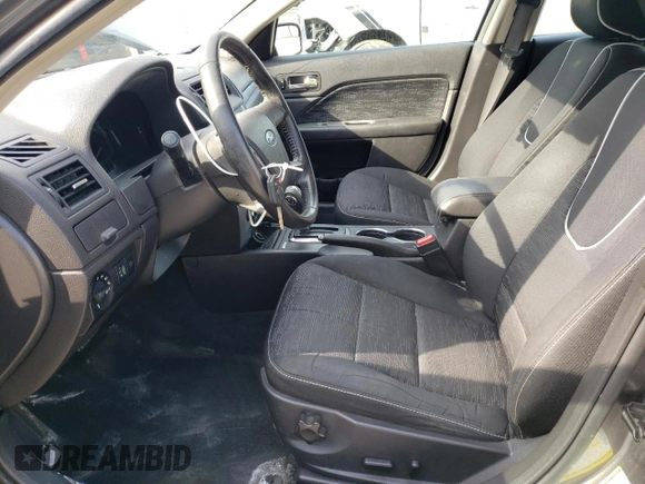 2012 Ford Fusion SE with VIN 3FAHP0HA4CR275893, listed as a Copart auction lot 52882725 with 192,725 mi miles and Salvage Title. Bid and sale history available at DreamBid. Image 7.