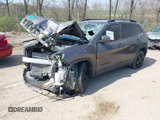 2021 Jeep Cherokee Altitude with VIN 1C4PJLLB8MD115101, listed as a IAAI auction lot 39082879 with 58,266 mi miles. Bid and sale history available at carsss.com. Image 2.