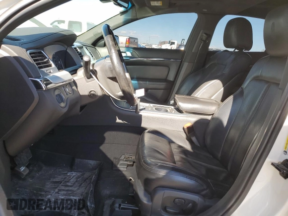 2009 Lincoln MKS with VIN 1LNHM94R59G611484, listed as a Copart auction lot 43998775 with 118,706 mi miles and Salvage Title. Bid and sale history available at DreamBid. Image 7.