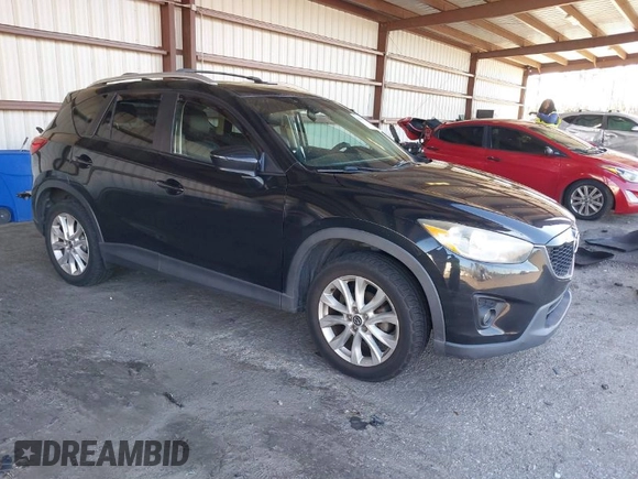 2013 Mazda CX-5 Grand Touring with VIN JM3KE2DE4D0127827, listed as a IAAI auction lot 41817214 with 108,295 mi miles. Bid and sale history available at carsss.com. Image 1.