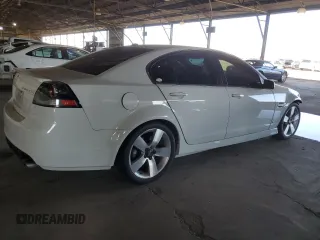 2009 Pontiac G8 GT with VIN 6G2EC57Y09L214446, listed as a Copart auction lot 77971444 with 82,552 mi miles and Salvage Title. Bid and sale history available at carsss.com. Image 3.