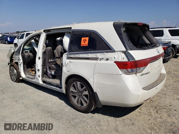 2015 Honda Odyssey Touring Elite z VIN 5FNRL5H90FB033511, wystawiony jako Copart lot #67718683 z przebiegiem Nie podano mil oraz Szkoda całkowita • Salvage title. Historia ofert i sprzedaży dostępna na DreamBid. Obrazek 2.