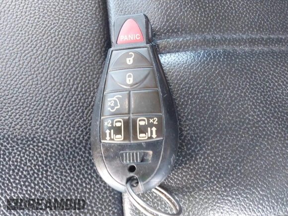 2014 Chrysler Town & Country Touring with VIN 2C4RC1BG8ER437451, listed as a IAAI auction lot 42172398 with 148,297 mi miles and . Bid and sale history available at DreamBid. Image 11.