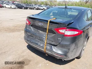 2015 Ford Fusion SE with VIN 3FA6P0H77FR221343, listed as a IAAI auction lot 42076089 with 136,812 mi miles. Bid and sale history available at carsss.com. Image 6.