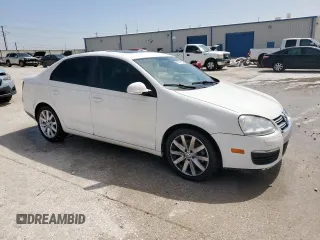 2010 Volkswagen Jetta Wolfsburg Edition with VIN 3VWRA7AJ0AM156555, listed as a Copart auction lot 56982155 with 72,054 mi miles and Salvage title. Bid and sale history available at DreamBid. Image 4.