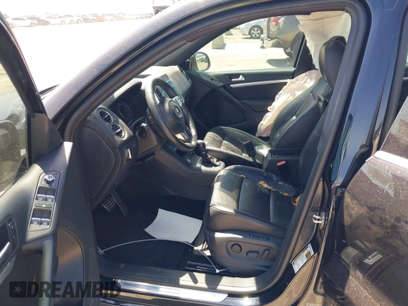 2014 Volkswagen Tiguan SEL with VIN WVGAV3AX4EW025339, listed as a IAAI auction lot 42313665 with 96,756 mi miles and . Bid and sale history available at DreamBid. Image 5.