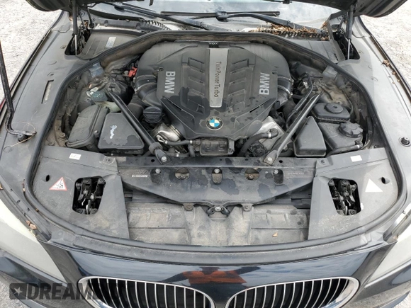 2012 BMW 7 Series 750i xDrive с VIN WBAKC6C57CC396244, выставлен на аукционе Copart как лот 52744475 с пробегом 153 984 миль миль и Чистый • Clean title. История ставок и продаж доступна на DreamBid. Изображение 11.