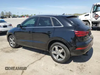 2015 Audi Q3 Premium Plus with VIN WA1BFCFS1FR004865, listed as a Copart auction lot 53348405 with 130,521 mi miles and Salvage title. Bid and sale history available at DreamBid. Image 2.