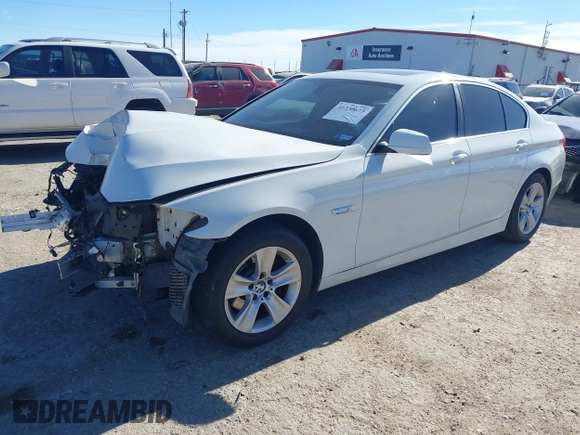 2013 BMW 5 Series 528i with VIN WBAXG5C59DDY32432, listed as a IAAI auction lot 41230673 with 103,069 mi miles and . Bid and sale history available at carsss.com. Image 2.
