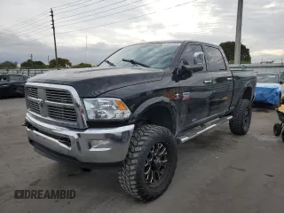 2012 Ram 2500 Laramie with VIN 3C6UD5FL2CG199239, listed as a Copart auction lot 87841525 with 83,183 mi miles and Salvage Title. Bid and sale history available at carsss.com. Image 1.