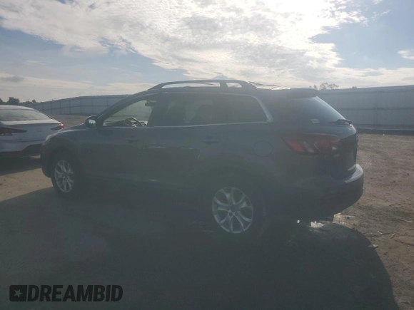 2015 Mazda CX-9 Touring z VIN JM3TB3CA2F0460970, wystawiony jako Copart lot #61544015 z przebiegiem 102 190 mil mil oraz Czysty tytuł • Clean title. Historia ofert i sprzedaży dostępna na DreamBid. Obrazek 2.