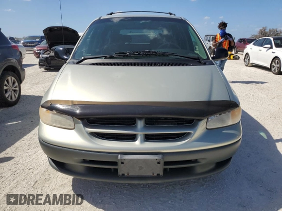 1999 Dodge Caravan SE with VIN 1B4GP44G5XB904043, listed as a Copart auction lot 77331804 with 105,141 mi miles and Clean Title. Bid and sale history available at DreamBid. Image 5.