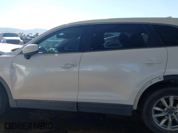 2016 Mazda CX-9 Sport with VIN JM3TCBBY0G0117159, listed as a IAAI auction lot 41302108 with 136,495 mi miles. Bid and sale history available at carsss.com. Image 14.
