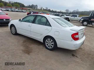2003 Toyota Camry LE with VIN 4T1BE30K73U227420, listed as a IAAI auction lot 41838940 with 213,470 mi miles and . Bid and sale history available at DreamBid. Image 3.