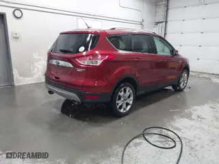 2015 Ford Escape Titanium with VIN 1FMCU9JX6FUA63473, listed as a IAAI auction lot 41816356 with 81,252 mi miles. Bid and sale history available at carsss.com. Image 4.