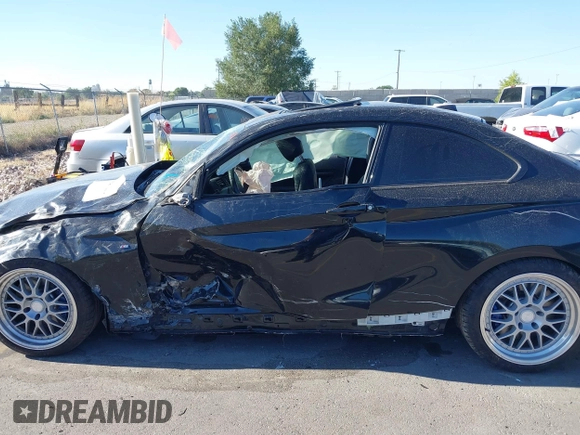 2014 BMW 2 Series M235i with VIN WBA1J7C50EVX33903, listed as a IAAI auction lot 40207684 with 81,766 mi miles and . Bid and sale history available at DreamBid. Image 13.