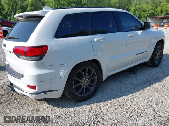 2021 Jeep Grand Cherokee Overland with VIN 1C4RJFCG3MC502165, listed as a IAAI auction lot 42404863 with 100,197 mi miles and . Bid and sale history available at DreamBid. Image 4.