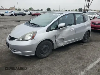 2013 Honda Fit with VIN JHMGE8H39DC041808, listed as a Copart auction lot 52563975 with 127,074 mi miles and Salvage Title. Bid and sale history available at carsss.com. Image 1.