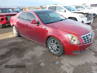 2012 Cadillac CTS Luxury with VIN 1G6DE5E54C0106592, listed as a IAAI auction lot 41682381 with 150,422 mi miles and . Bid and sale history available at DreamBid. Image 1.