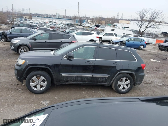 2011 Jeep Grand Cherokee Laredo with VIN 1J4RR4GGXBC511475, listed as a IAAI auction lot 41554620 with 164,361 mi miles. Bid and sale history available at carsss.com. Image 14.