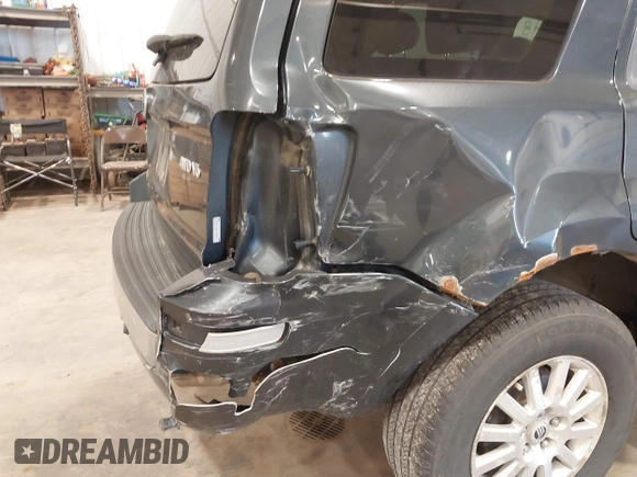 2008 Mercury Mariner Premier with VIN 4M2CU97168KJ20982, listed as a IAAI auction lot 41999498 with 151,524 mi miles and . Bid and sale history available at DreamBid. Image 6.